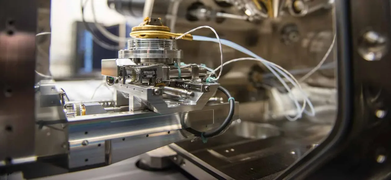 Sample stage inside Nano3’s dual-beam focused-ion-beam microscope